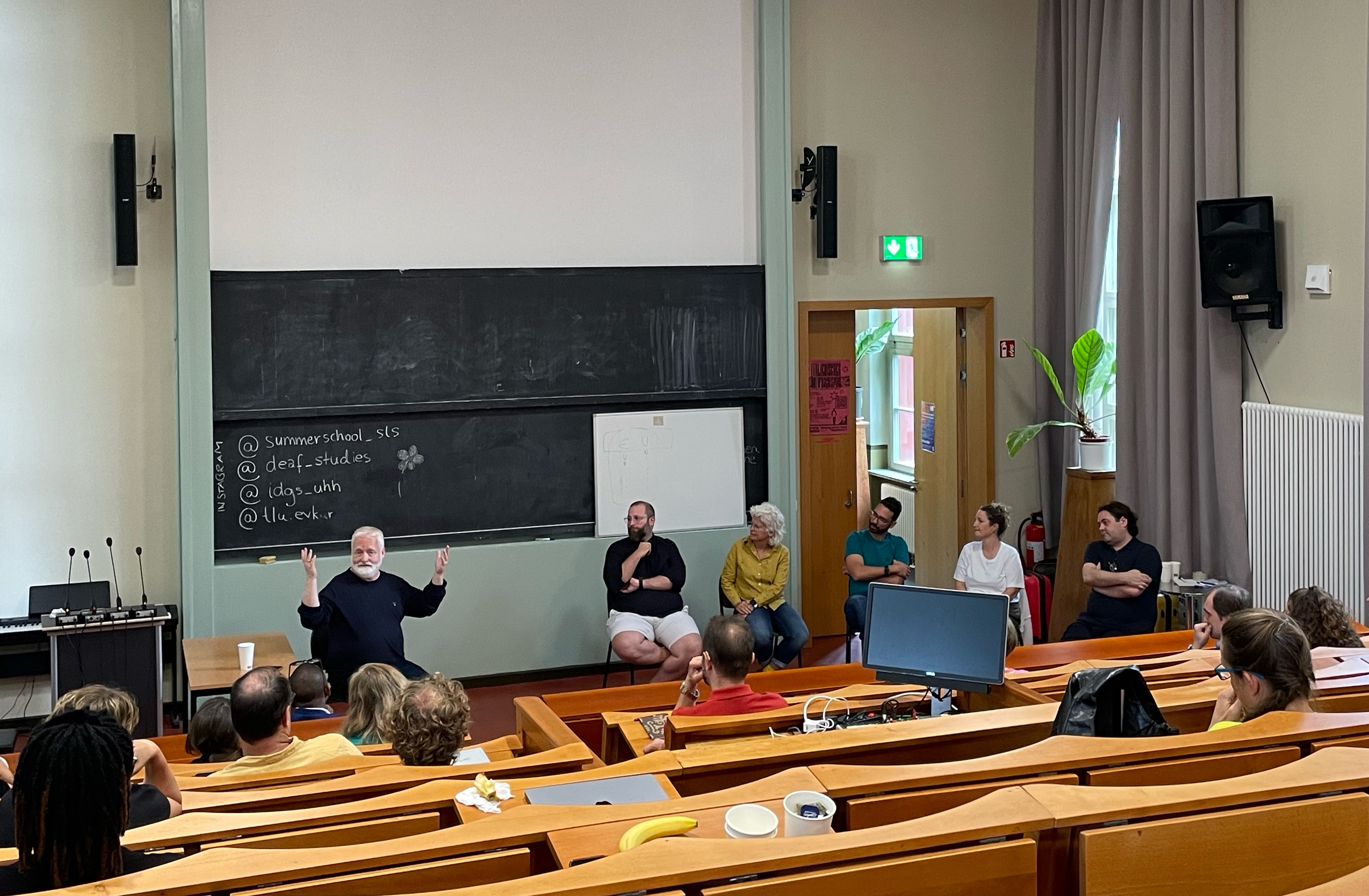 Image of classroom at summer school showing Christian Rathmann, Peter Romanek, Marta Morgado, Mirko Santoro, Kate Rowley and Christopher Stone.